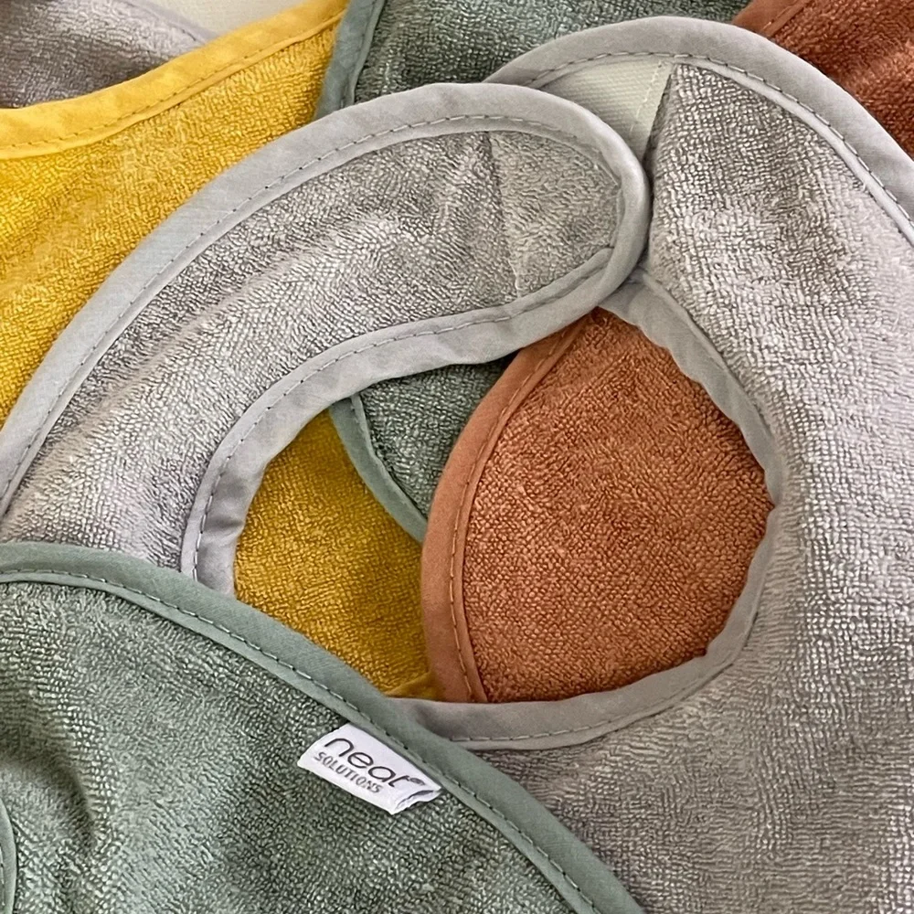 Baby Bibs by NEAT SOLUTIONS Set of 8 Mustard, Sage, Rust, Gray